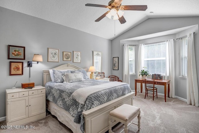 714 Copperhead Cir, Saint Augustine, FL 32092 - bedroom with a textured ceiling, baseboards, a ceiling fan, light carpet, and lofted ceiling