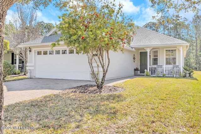 714 Copperhead Cir, Saint Augustine, FL 32092 - view of front of property with driveway, stucco siding, and a garage