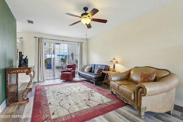 535 Hedgewood Dr, Saint Augustine, FL 32092 - living area with baseboards, visible vents, wood finished floors, and ceiling fan