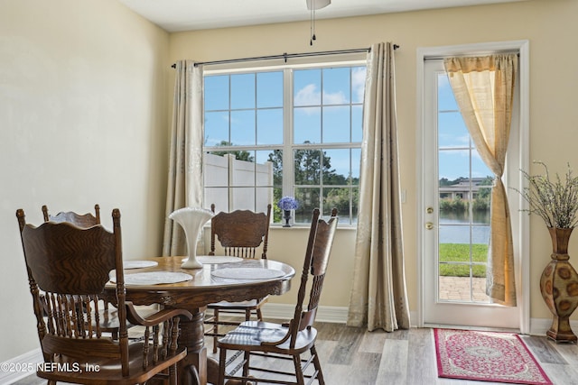 535 Hedgewood Dr, Saint Augustine, FL 32092 - dining room with a wealth of natural light, baseboards, and wood finished floors