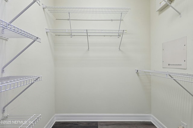 535 Hedgewood Dr, Saint Augustine, FL 32092 - spacious closet with dark wood finished floors