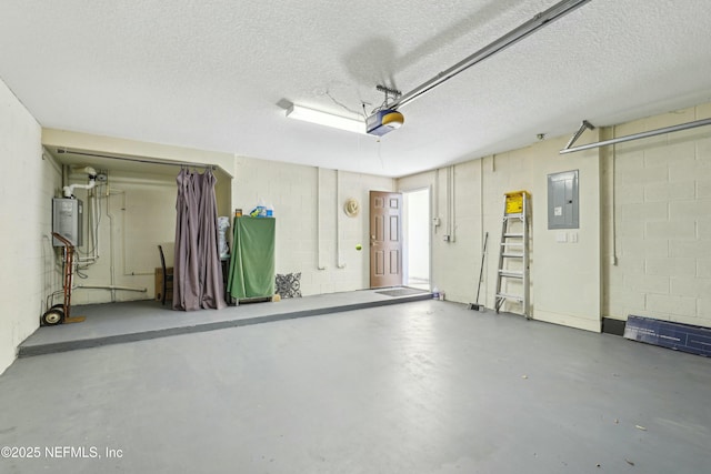 535 Hedgewood Dr, Saint Augustine, FL 32092 - garage featuring concrete block wall, water heater, electric panel, and a garage door opener