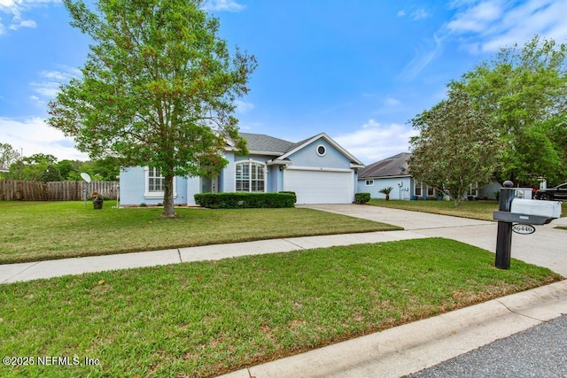 single story home with an attached garage, concrete driveway, fence, stucco siding, and a front lawn