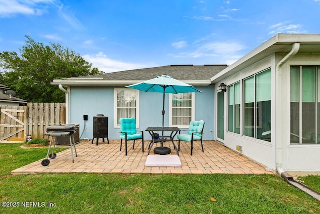 view of patio / terrace with fence