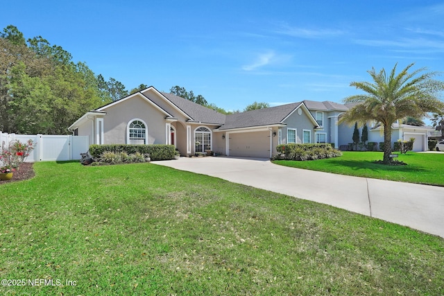 ranch-style house with a front yard, concrete driveway, stucco siding, fence, and an attached garage