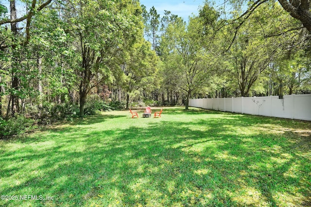 view of yard featuring fence