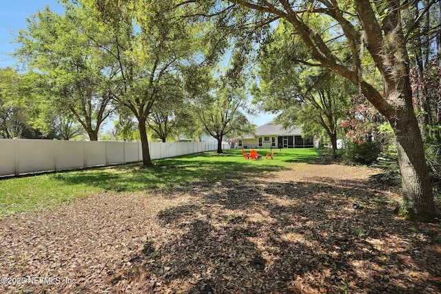 view of yard featuring a fenced backyard