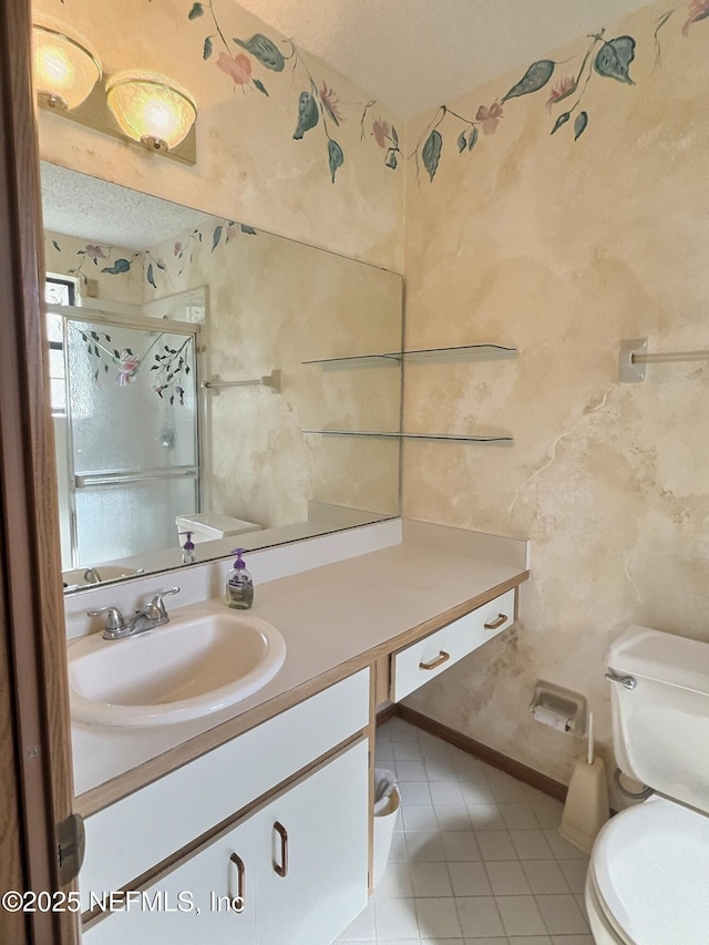 38 Rymer Ln, Palm Coast, FL 32164 - bathroom with vanity, tile patterned floors, a shower stall, and toilet