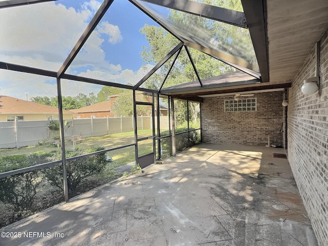 38 Rymer Ln, Palm Coast, FL 32164 - view of patio featuring a lanai and fence