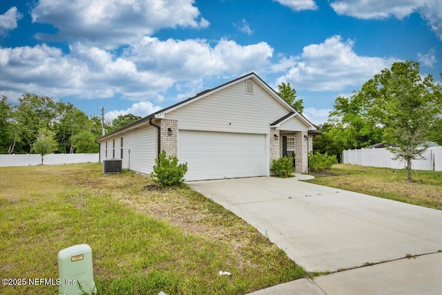 7271 Gateway Ct, Jacksonville, FL 32219 - view of front of property featuring cooling unit, driveway, and a garage
