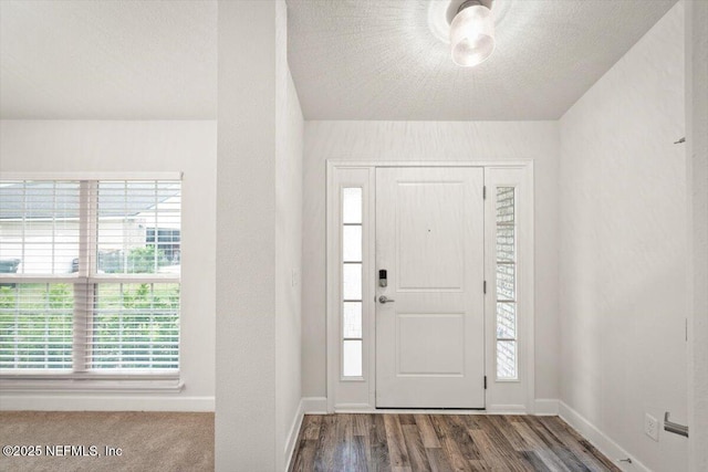7271 Gateway Ct, Jacksonville, FL 32219 - entryway with baseboards, wood finished floors, and plenty of natural light