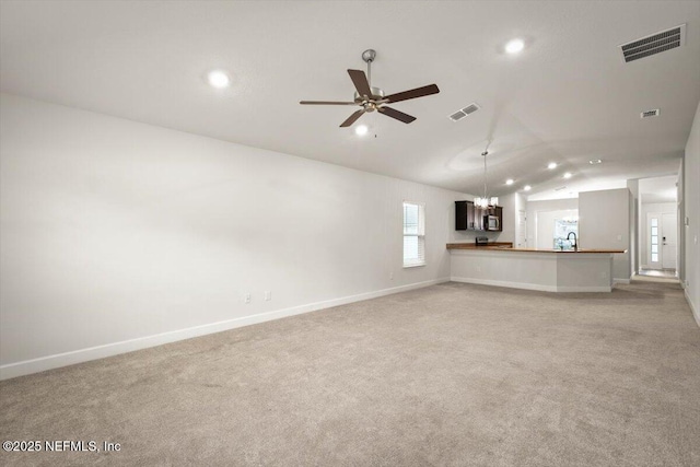 7271 Gateway Ct, Jacksonville, FL 32219 - unfurnished living room with lofted ceiling, light carpet, recessed lighting, baseboards, and a ceiling fan