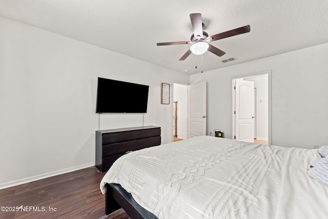 9087 Leicestershire Ct, Jacksonville, FL 32219 - bedroom with a textured ceiling, visible vents, baseboards, ceiling fan, and wood finished floors