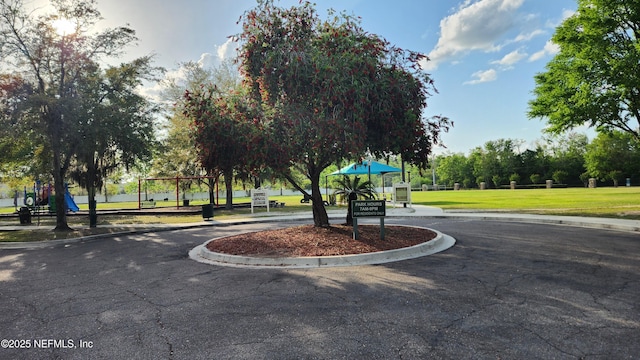 9087 Leicestershire Ct, Jacksonville, FL 32219 - view of home's community featuring a lawn and playground community