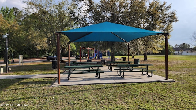9087 Leicestershire Ct, Jacksonville, FL 32219 - view of community with a lawn and playground community
