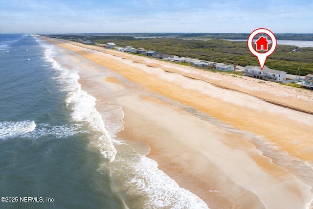 property view of water featuring a beach view
