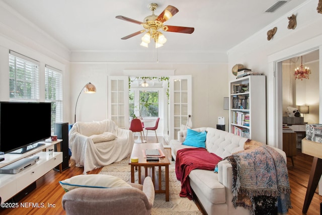 1516 Aberdeen St, Jacksonville, FL 32205 - living room with visible vents, wood finished floors, and plenty of natural light