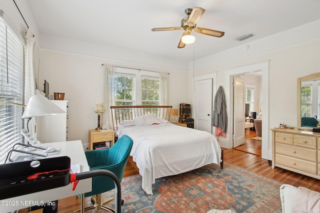 1516 Aberdeen St, Jacksonville, FL 32205 - bedroom with a ceiling fan, wood finished floors, multiple windows, and visible vents