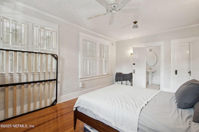 1516 Aberdeen St, Jacksonville, FL 32205 - bedroom with a textured wall, crown molding, and wood finished floors
