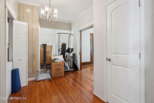 1516 Aberdeen St, Jacksonville, FL 32205 - hall with an inviting chandelier, crown molding, baseboards, and wood finished floors