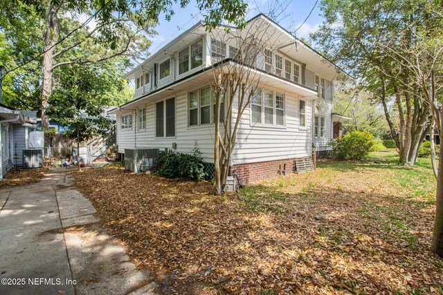 1516 Aberdeen St, Jacksonville, FL 32205 - view of property exterior with central AC and fence
