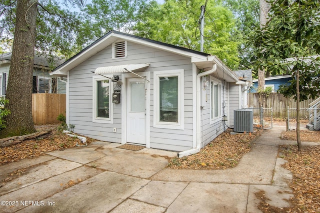 1516 Aberdeen St, Jacksonville, FL 32205 - view of front of house with central AC, fence, and a patio