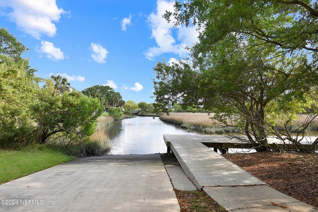 view of dock with a water view