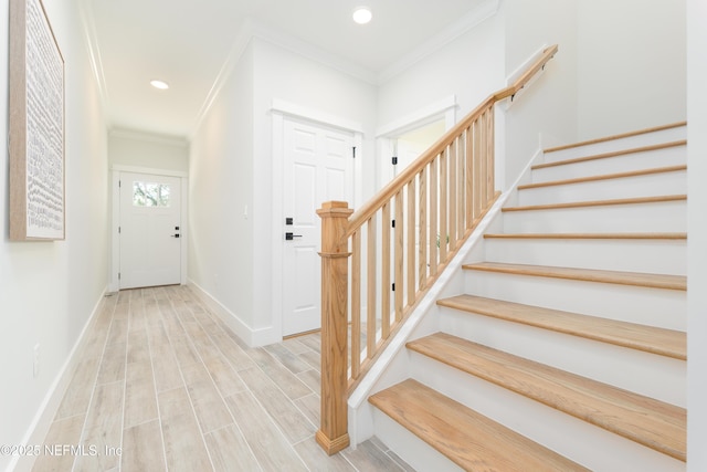803 12th Ave S, Jacksonville Beach, FL 32250 - entrance foyer with crown molding, stairway, baseboards, recessed lighting, and wood finished floors