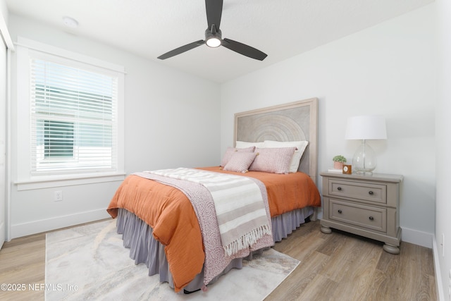 803 12th Ave S, Jacksonville Beach, FL 32250 - bedroom with light wood-style flooring, baseboards, multiple windows, and a ceiling fan