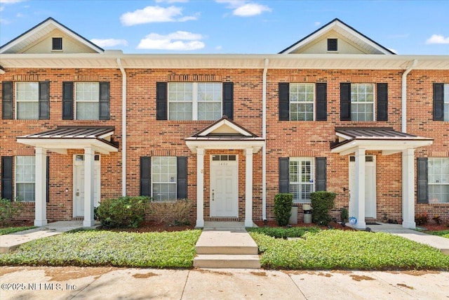 1492 Fieldview Dr, Jacksonville, FL 32225 - view of property with a standing seam roof and brick siding