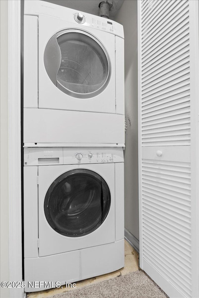 1492 Fieldview Dr, Jacksonville, FL 32225 - laundry room with laundry area and stacked washing maching and dryer