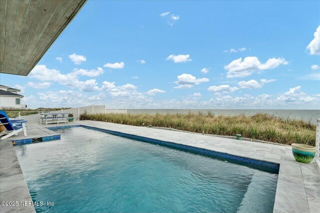 outdoor pool with a patio