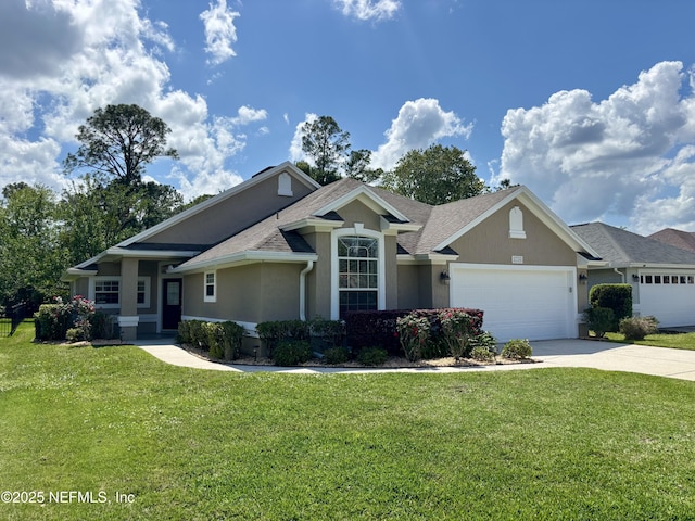 craftsman-style home featuring roof with shingles, concrete driveway, a garage, a front yard, and stucco siding