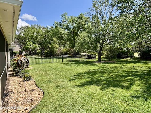 view of yard with fence