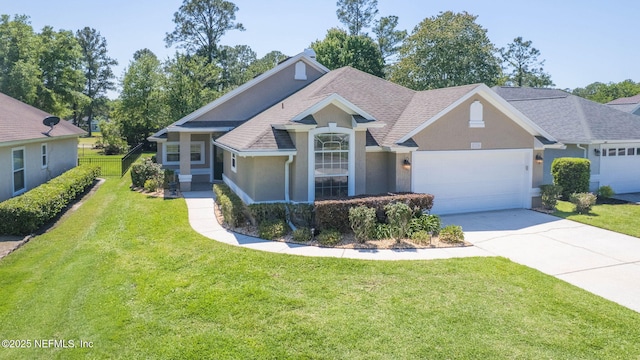 craftsman house featuring a front lawn, concrete driveway, a garage, a shingled roof, and stucco siding