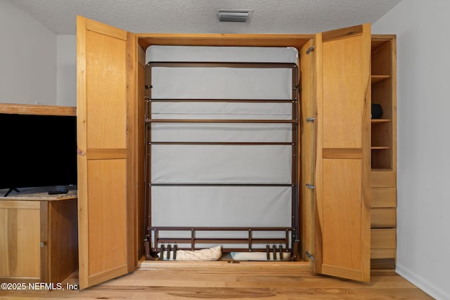 closet featuring visible vents