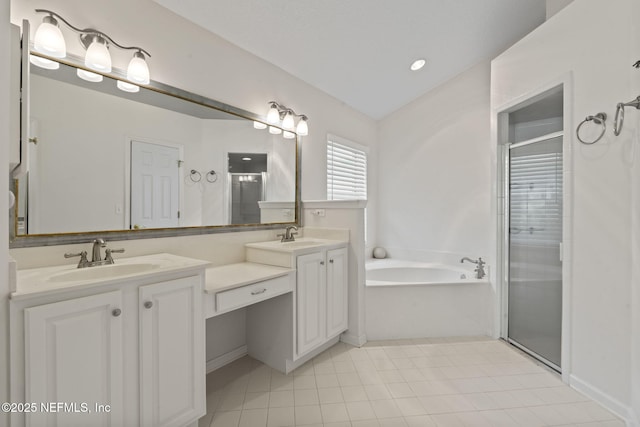 bathroom featuring a shower stall, a bath, a sink, and double vanity