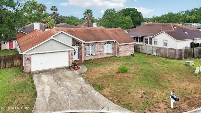 view of front of home featuring brick siding, a garage, and concrete driveway