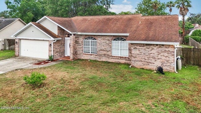 view of front of home with brick siding, a garage, concrete driveway, and roof with shingles