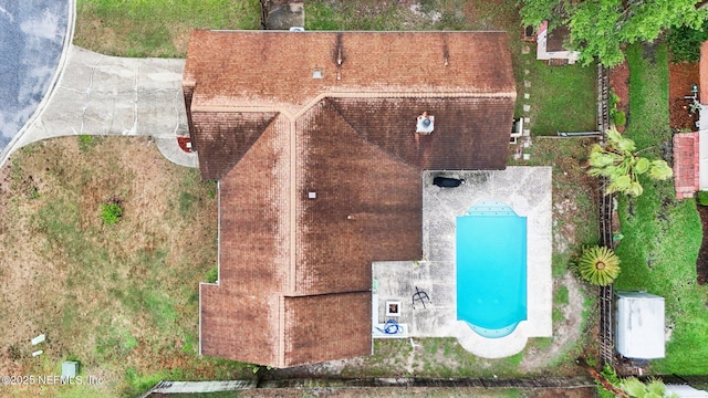view from above of property with a pool area
