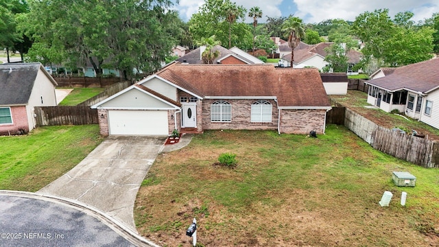 view of front of home featuring concrete driveway, a garage, and brick siding