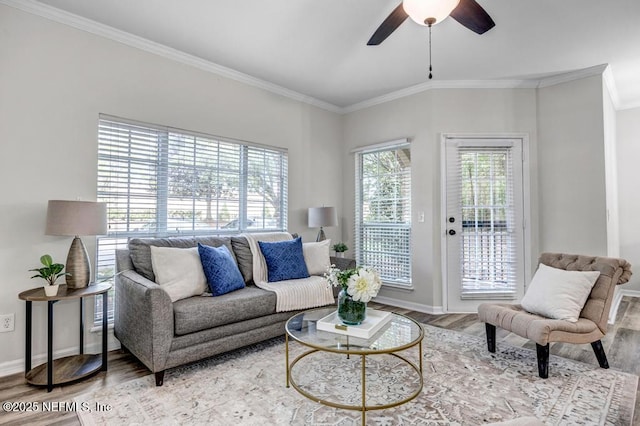7800 Point Meadows Dr Unit 1511, Jacksonville, FL 32256 - living room with baseboards, ceiling fan, wood finished floors, and crown molding