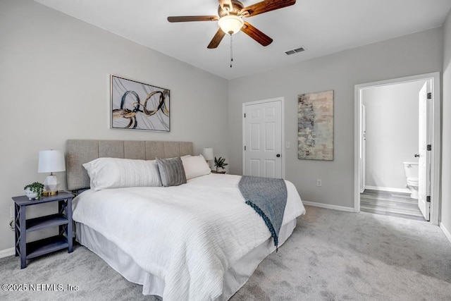 7800 Point Meadows Dr Unit 1511, Jacksonville, FL 32256 - bedroom featuring a ceiling fan, light carpet, baseboards, and visible vents