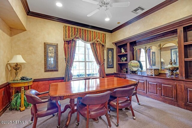 7800 Point Meadows Dr Unit 1511, Jacksonville, FL 32256 - dining room featuring visible vents, crown molding, light colored carpet, and wainscoting
