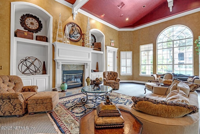 7800 Point Meadows Dr Unit 1511, Jacksonville, FL 32256 - living area featuring ornamental molding, high vaulted ceiling, baseboards, and a premium fireplace