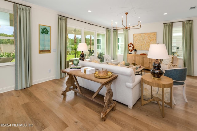 928 Caiden Dr, Ponte Vedra, FL 32081 - living room with a chandelier, healthy amount of natural light, light wood finished floors, and recessed lighting