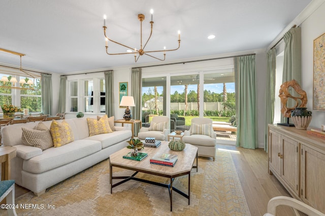 928 Caiden Dr, Ponte Vedra, FL 32081 - living room with a chandelier, plenty of natural light, light wood finished floors, and recessed lighting