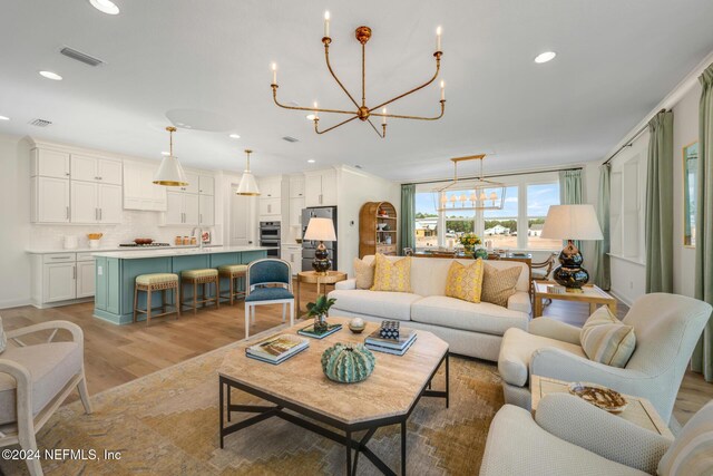 928 Caiden Dr, Ponte Vedra, FL 32081 - living area featuring a chandelier, light wood-type flooring, and recessed lighting