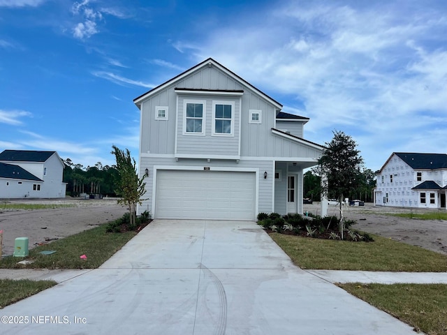 928 Caiden Dr, Ponte Vedra, FL 32081 - view of front of home featuring board and batten siding, an attached garage, and driveway