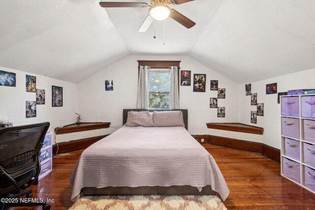 2541 Grand St, Jacksonville, FL 32208 - bedroom featuring baseboards, vaulted ceiling, a ceiling fan, and wood finished floors